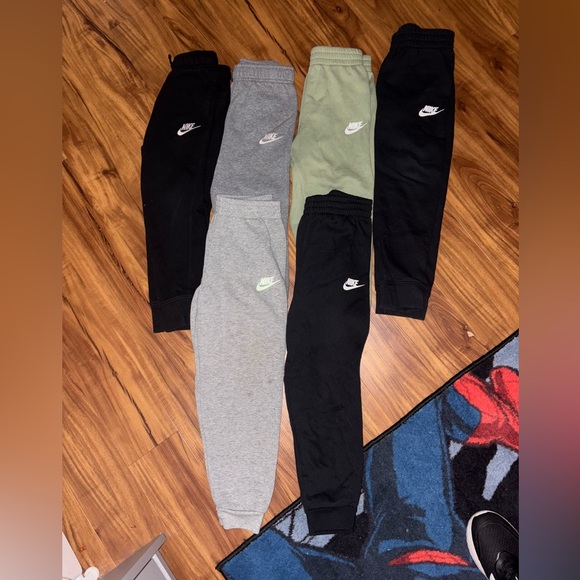 Nike Jogger Pants - Black, Gray, Olive

Boys size 7. - Picture 1 of 3